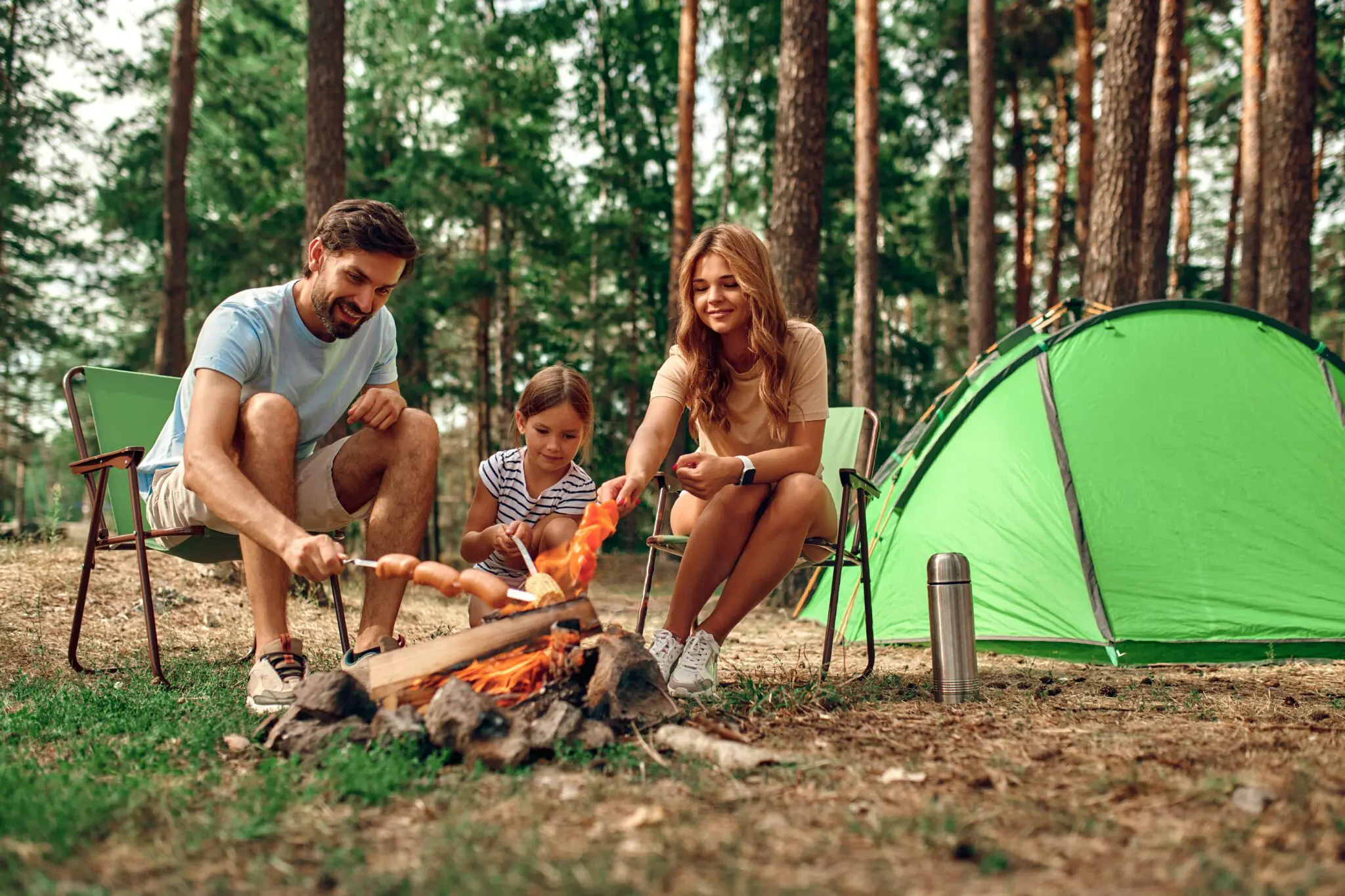 Happy,Family,With,A,Child,On,A,Picnic,Sit,By