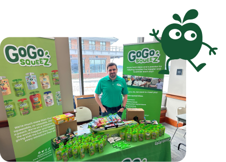 Gogo Squeez booth at an event in the community